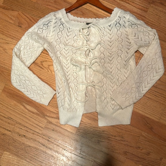 Delia’s size XS tie up back closure sweater white - Picture 2 of 5